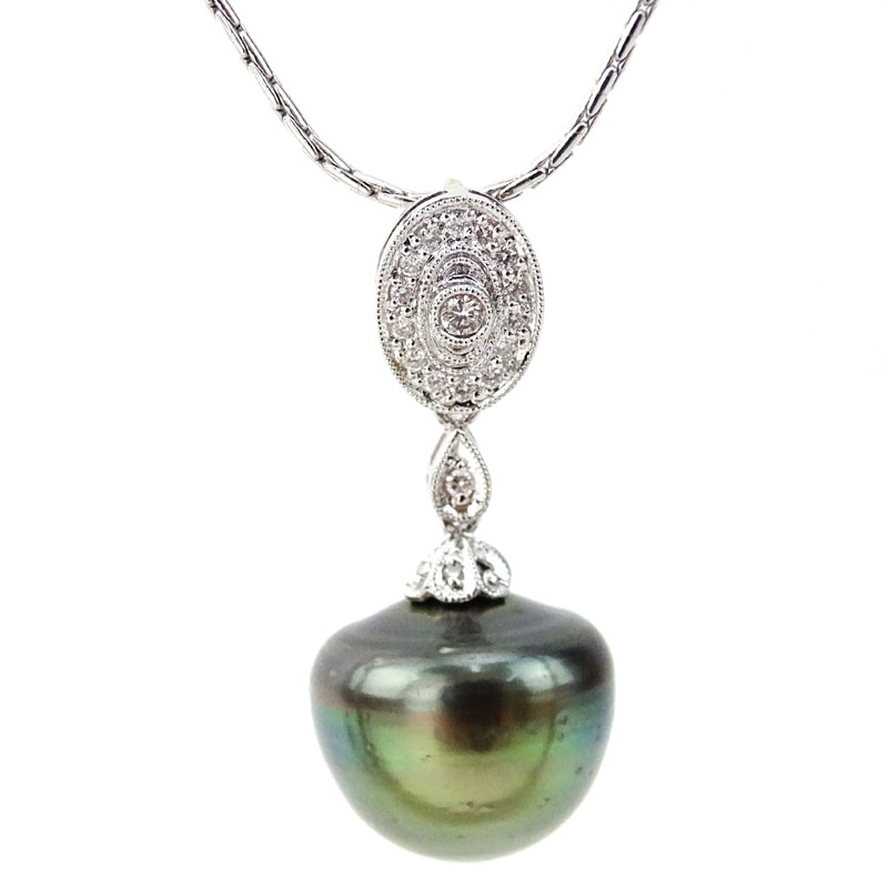 15mm South Sea Baroque Black Pearl and 14 Karat White Gold Pendant Necklace with Small Diamond Accents.