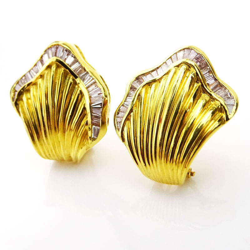 Pair of 18 Karat Yellow Gold Earrings Accented throughout with Tapered Baguette Cut Diamonds.