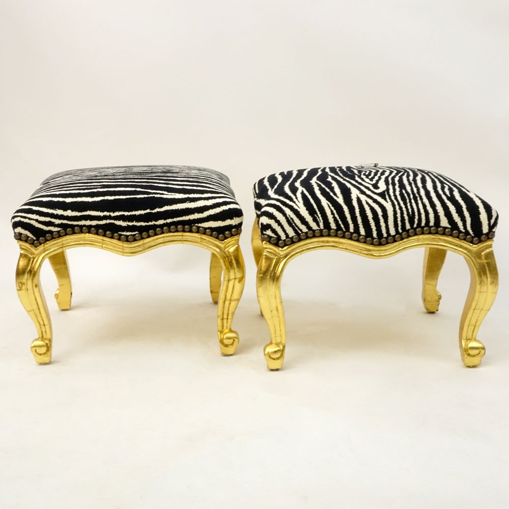 Pair of Vintage Louis XV style Carved and Gold-Leafed Tabourets with Faux Zebra Upholstery.