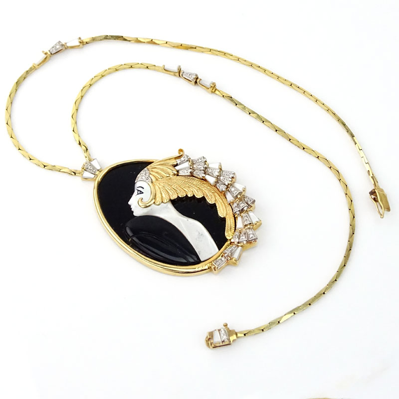 Erte, French (1892-1990) Vintage 14 Karat Yellow Gold, Black Onyx, Mother of Pearl and Diamond "Beauty of the Beast" Pendant Necklace