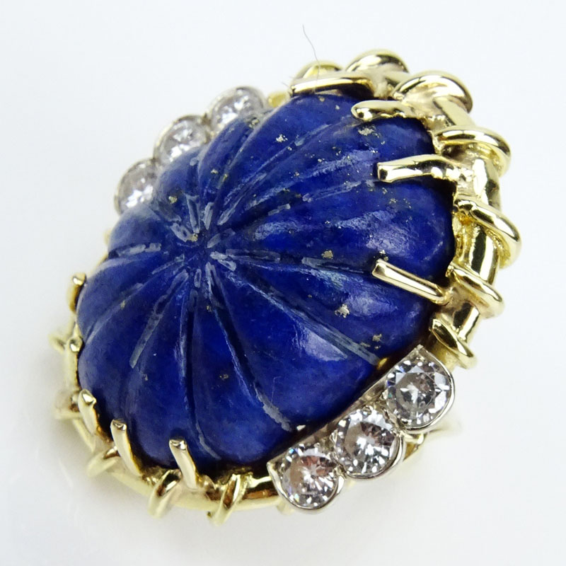 1.20 Carat Round Brilliant Cut Diamond, 14 Karat Yellow Gold and Carved Lapis Lazuli Ring. 