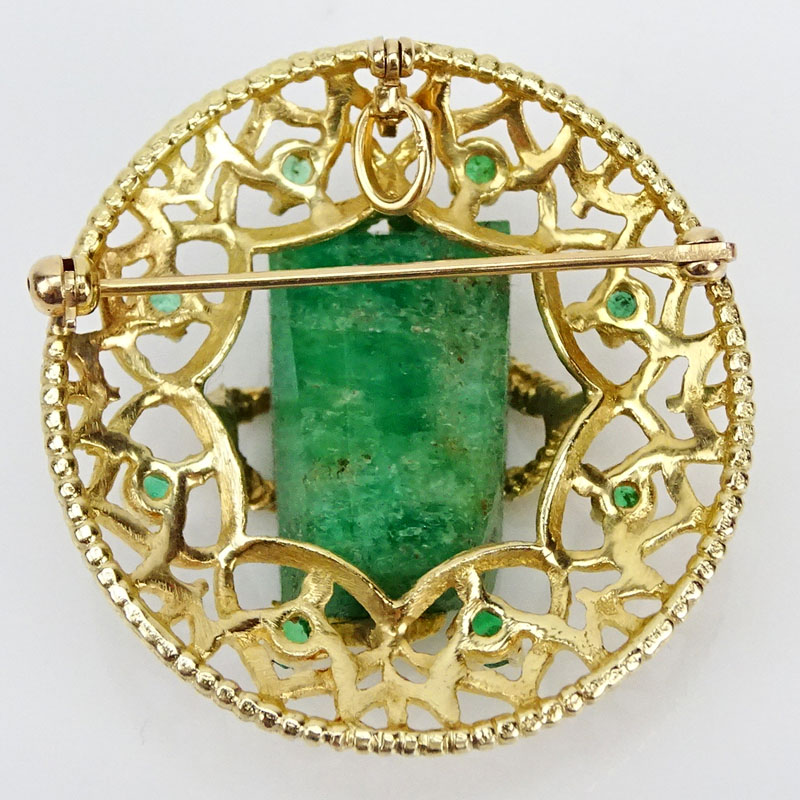 Vintage 14 Karat Yellow Gold and Large Natural Rough Emerald Pendant Brooch Further accented with eight round cut Emeralds