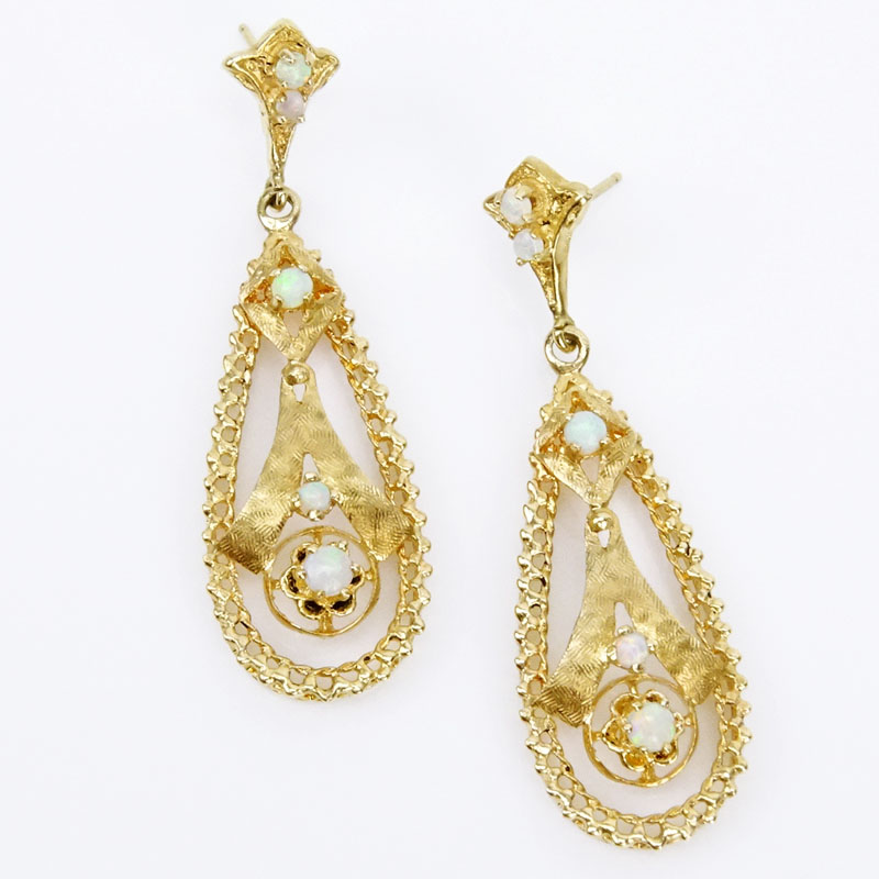 Vintage 14 Karat Yellow Gold Pendant Earrings accented with small White Opals