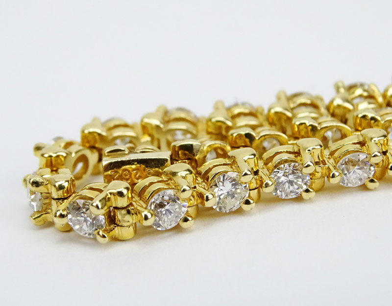 6.05 Carat Round Brilliant Cut Diamond and 14 Karat Yellow Gold Line Bracelet.
