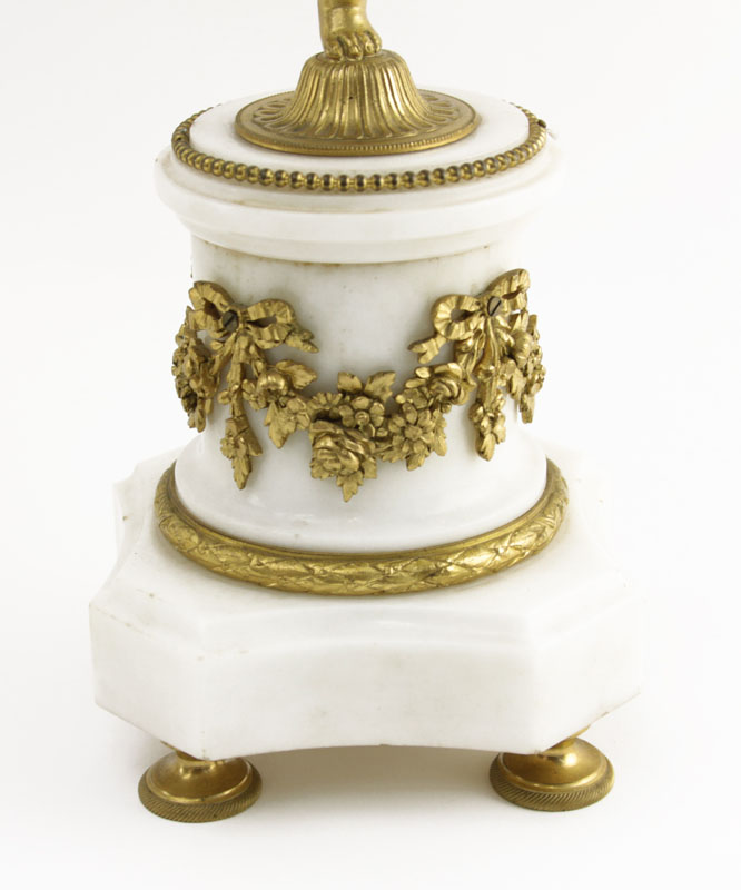 A 19th Century French Louis XVI Style Figural Three Piece Clock Garniture