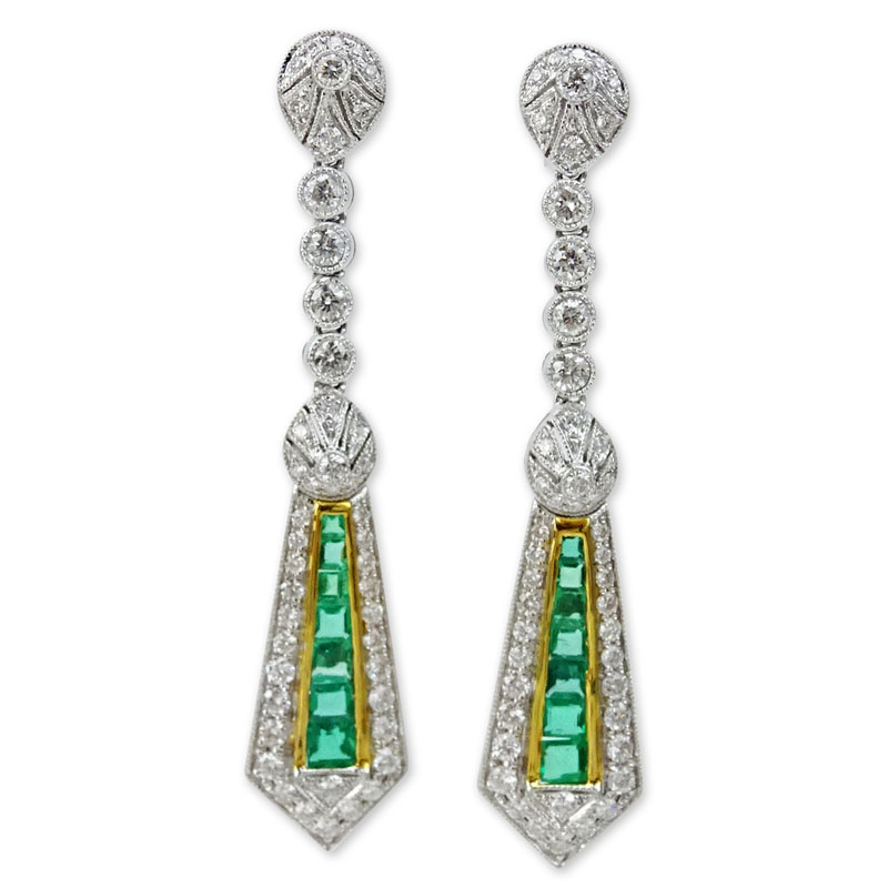 1.70 Carat Round Brilliant Cut Diamond. 1.41 Carat Emerald and 18 Karat Gold Pendant Earrings.
