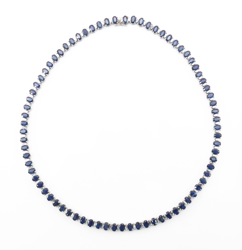 Approx. 50.0 Carat Oval Cut Sapphire, 3.0 Carat Baguette Cut Diamond and 18 Karat White Gold Necklace