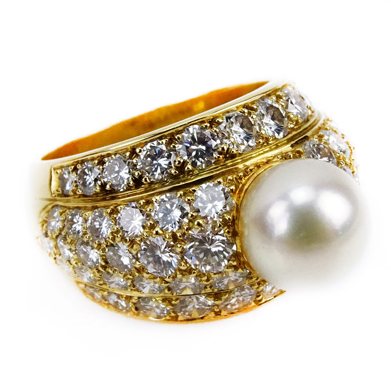 Cartier Approx. 5.0 Carat Round Brilliant Cut Diamond, 8.45mm Pearl and 18 Karat Yellow Gold Ring. 