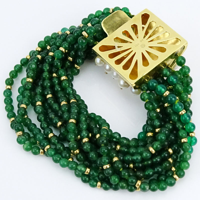 Circa 1950s Twelve (12) Strand Emerald Bead, Pearl and 18 Karat Yellow Gold Bangle Bracelet