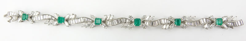 Circa 1950s Approx. 10.0 Carat TW Marquise and Baguette Cut Diamond, 3.50 Carat 3.50 carat Rectangular Cut Emerald and Platinum Bracelet. 