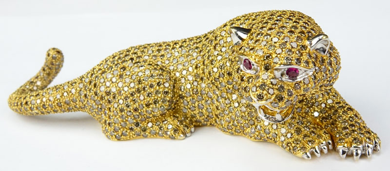38.50 Carat Natural Color Diamond and 18 Karat Yellow Gold Panther Objet D'Art set with Ruby Eyes. Stamped 18K