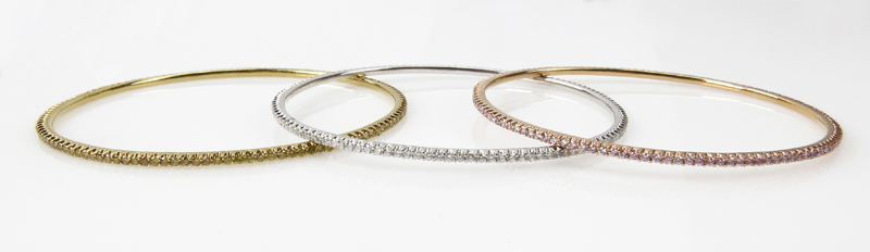 Three Diamond and 18 Karat Gold Bangle Bracelets