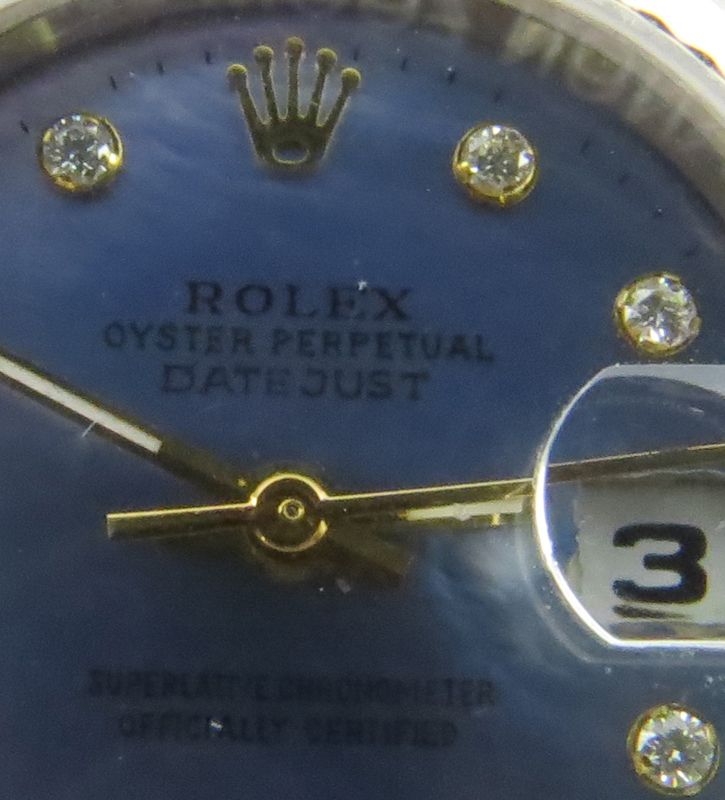 Lady's Rolex DateJust Two Tone Stainless Steel and 14 Karat Yellow Gold Automatic Movement Watch with Mother of Pearl Dial and Diamond Hour Markers