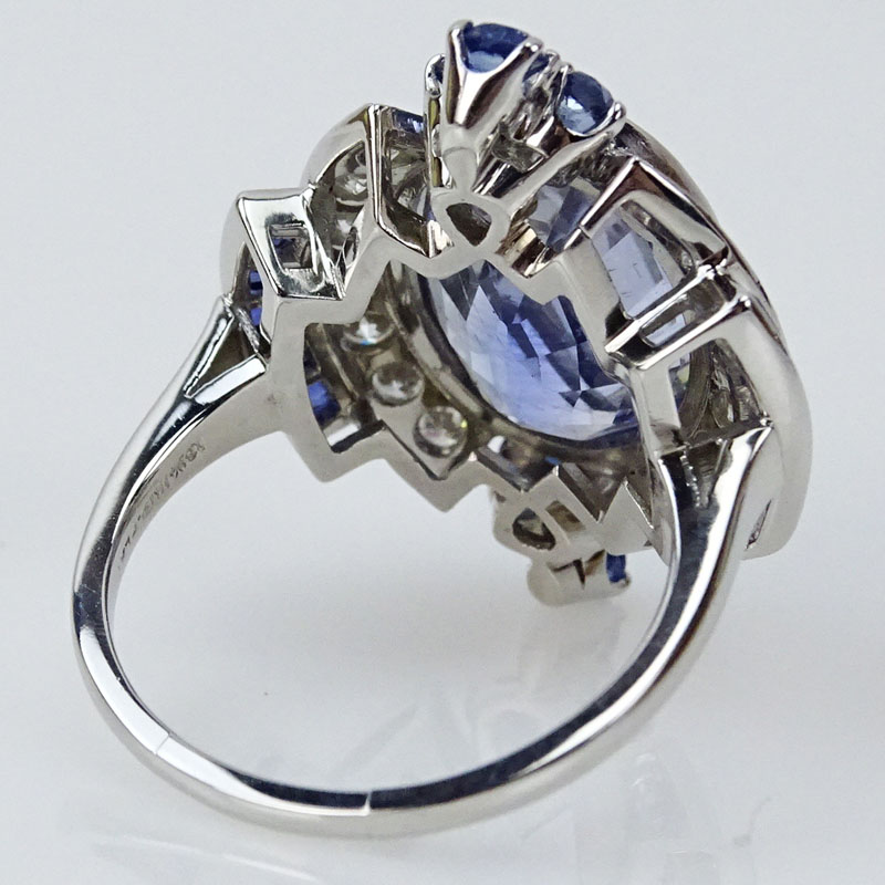 Art Deco style Approx. 1.0 Carat Round Brilliant Cut Diamond, 2.0 Carat Round and Baguette Cut Sapphire and Platinum Ring