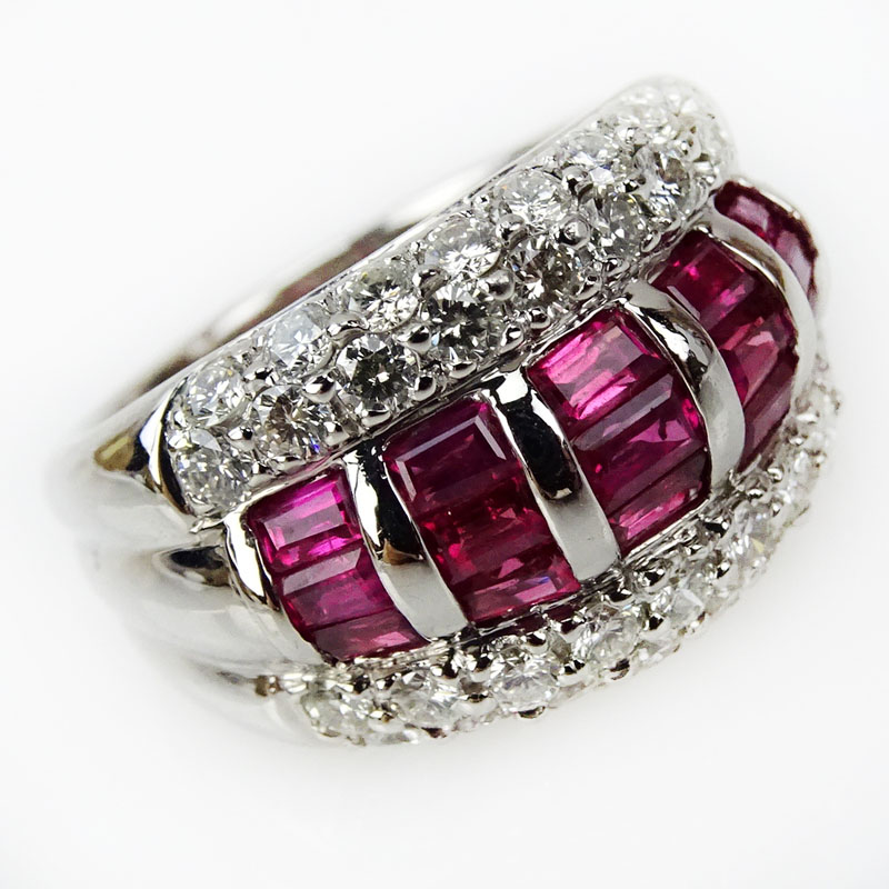 Approx. 2.10 Carat Invisible Set Ruby, 1.30 Carat Pave set Diamond and Platinum Ring. Rubies with vivid saturation of color