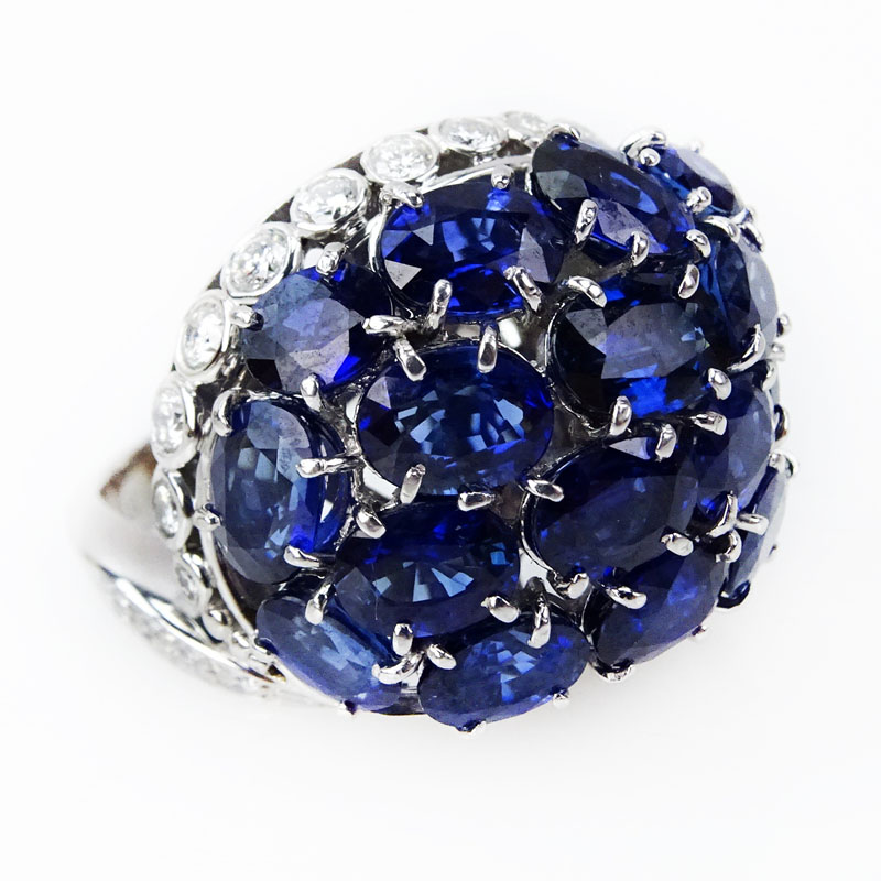 Approx. 13.65 Carat Oval and Round Cut Sapphire, 1.11 Carat Round Brilliant Cut Diamond and Platinum Ring