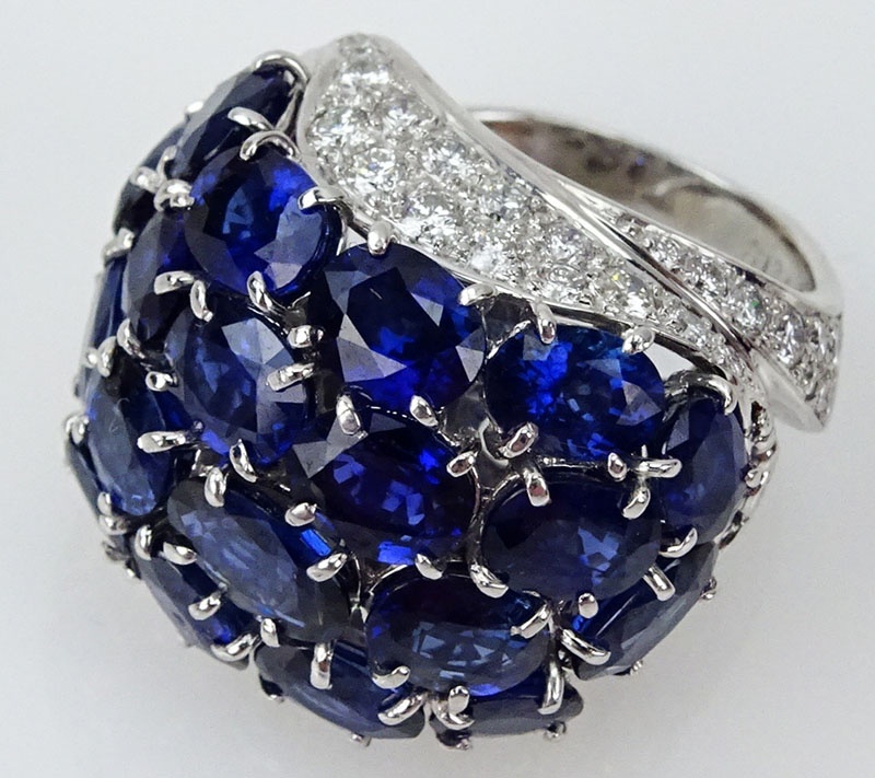 Approx. 13.65 Carat Oval and Round Cut Sapphire, 1.11 Carat Round Brilliant Cut Diamond and Platinum Ring