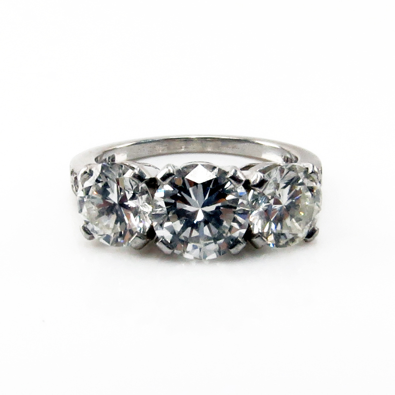 Vintage Tiffany & Co approx. 3.05 Carat TW Round Brilliant Cut Diamond and Platinum Three Stone Engagement Ring
