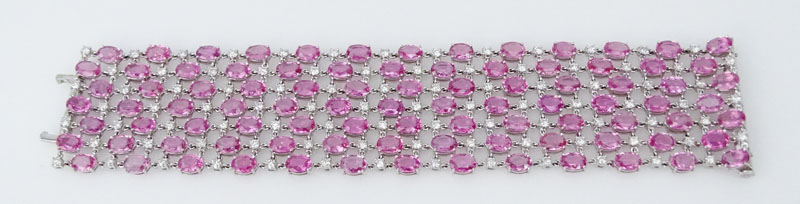 78.0 Carat Oval Cut Pink Sapphire, 6.06 Carat Round Brilliant Cut Diamond and 18 Karat White Gold Bracelet. 