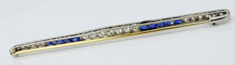 2.5 Carat European Cut Diamond, 1.50 Carat Sapphire and Platinum Bar Brooch. 