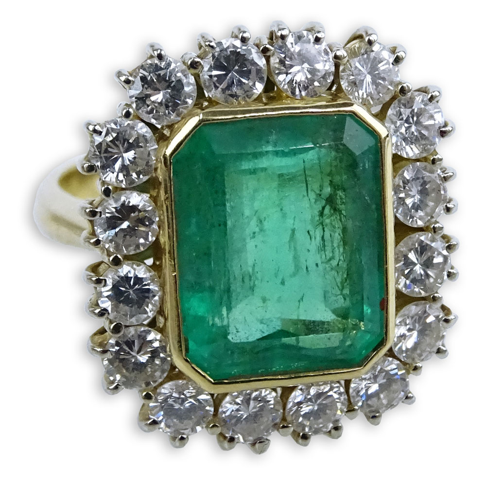 AIG Certified 5.09 Carat Rectangular Step Cut Emerald, 1.76 Carat Round Brilliant Cut Diamond and 18 Karat Yellow Gold Ring. 