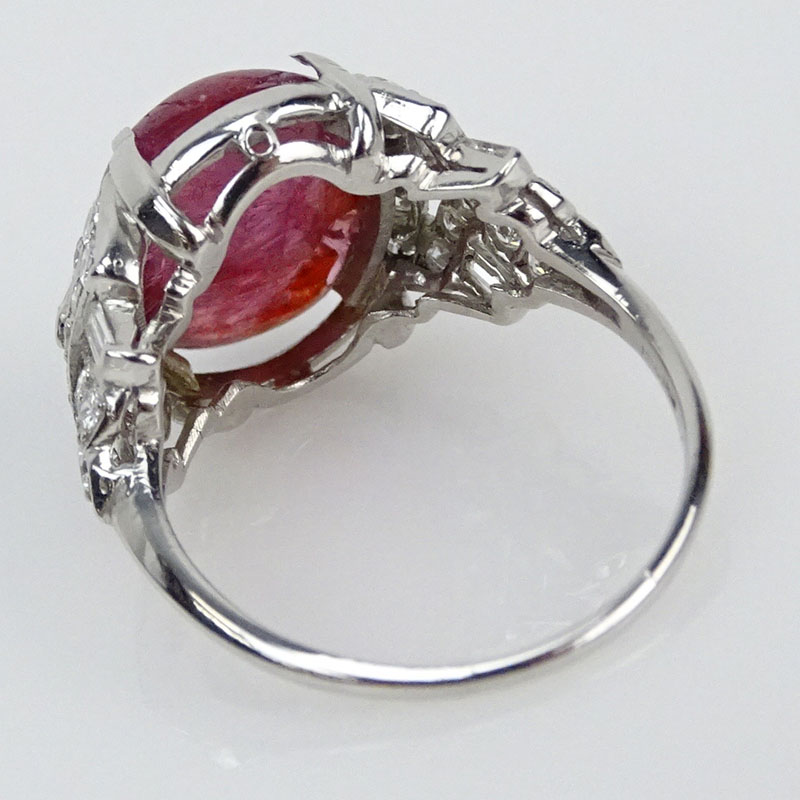 Lady's Art Deco Cabochon Ruby, 1.10 Carat Diamond and Platinum Ring. Ruby measures 15mm x 11.5mm. Diamonds 