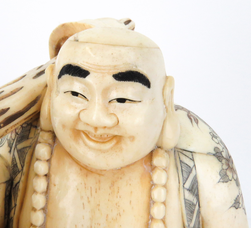Japanese Carved Bone Polychrome Traveling Buddha Figurine