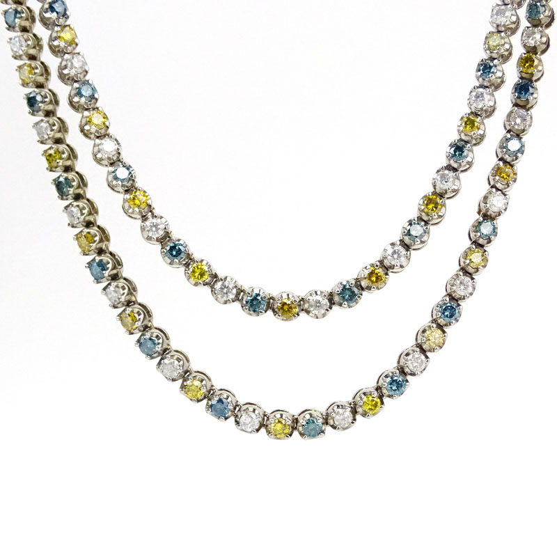  37.0 Carat Round Brilliant Cut Alternating Colorless, Fancy Blue and Fancy Yellow Diamond and 14 Karat White Gold Necklace. 