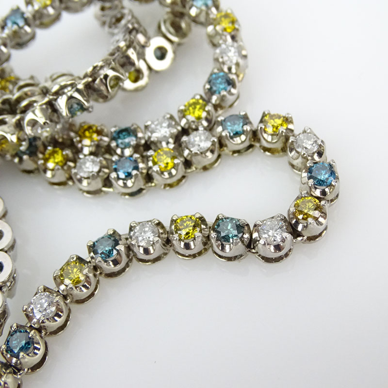  37.0 Carat Round Brilliant Cut Alternating Colorless, Fancy Blue and Fancy Yellow Diamond and 14 Karat White Gold Necklace. 