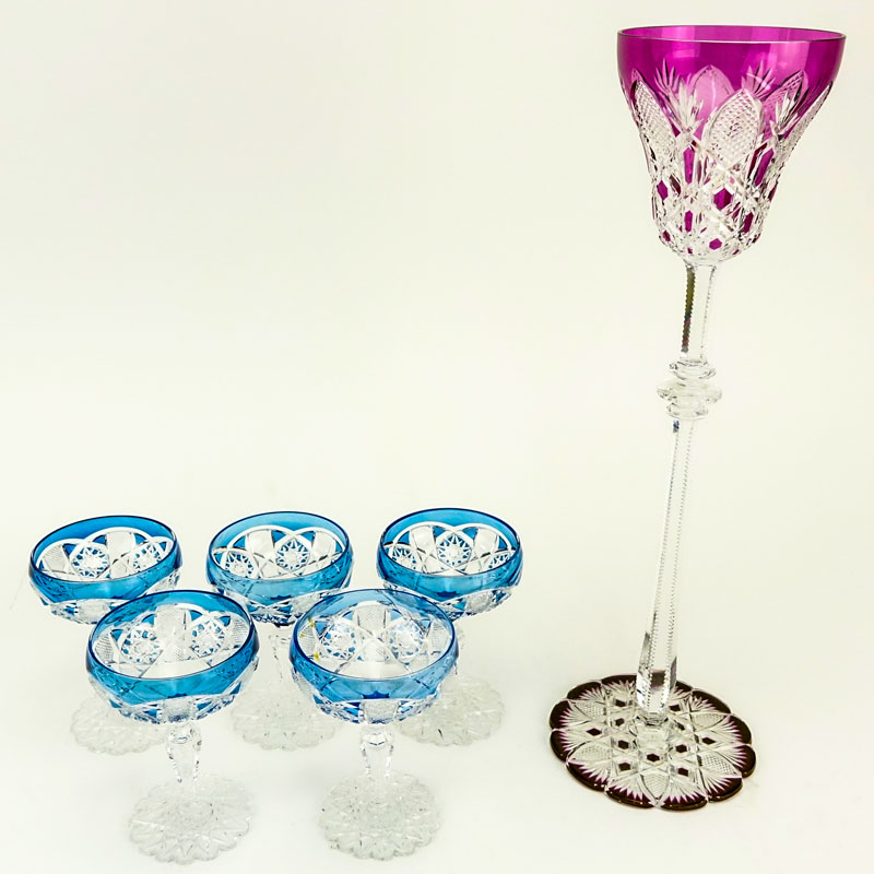 Six (6) Pieces St Louis Crystal Stemware. Featuring an extra tall wine hock and 5 small champagne glasses.