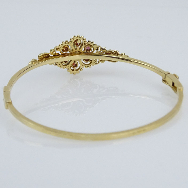 Vintage 14 Karat Yellow Gold Hinged Bangle Bracelet with Round Cut Rubies and White Pearls