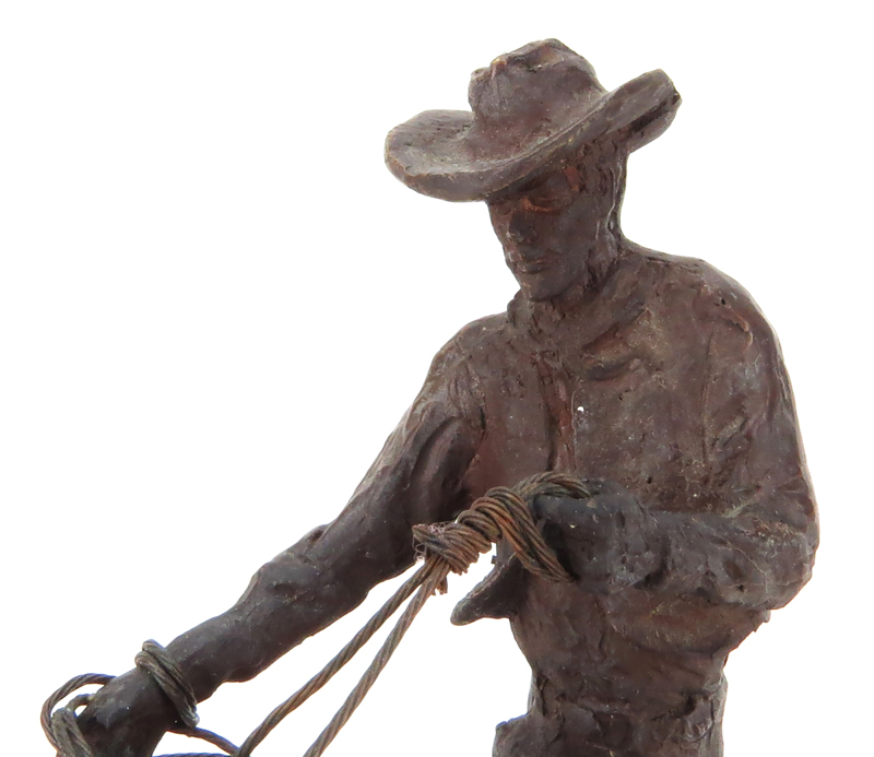 After: C.M. Russell, American (1864-1926) "Cowboy Roping Bull" Bronze Sculpture on Black Marble Base. 