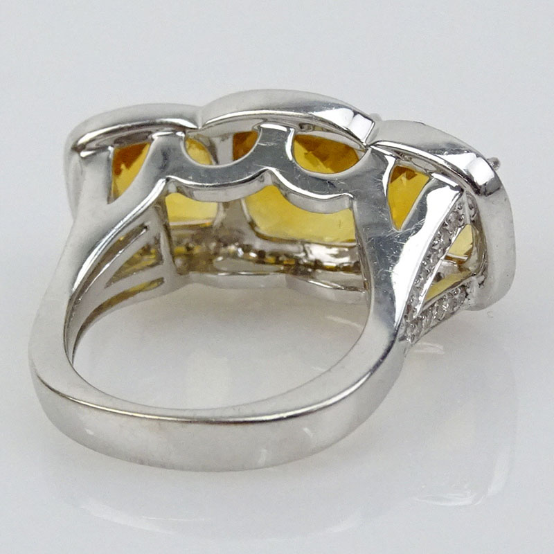Lady's Citrine and 14 Karat White Gold Three Stone Ring Accented Throughout with Small Round Cut Diamonds