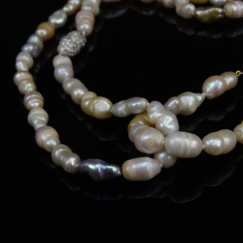Vintage Multicolor Baroque Pearl Necklace with One Each 14 Karat Yellow and White Gold Bean Shape Spacer, each pave set with small Round Cut Diamonds
