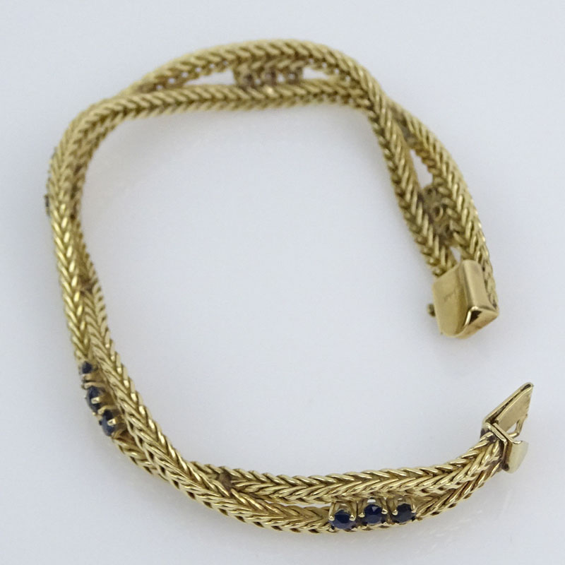 Vintage 14 Karat Yellow Gold Flexible Rope Link Bracelet with Round Cut Sapphires