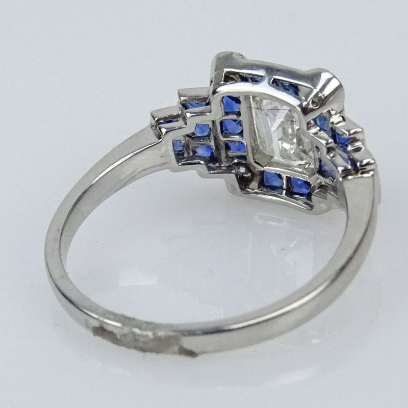  1.0 Carat Emerald Cut Diamond, 1.27 Carat French Cut Sapphire and Platinum Ring.