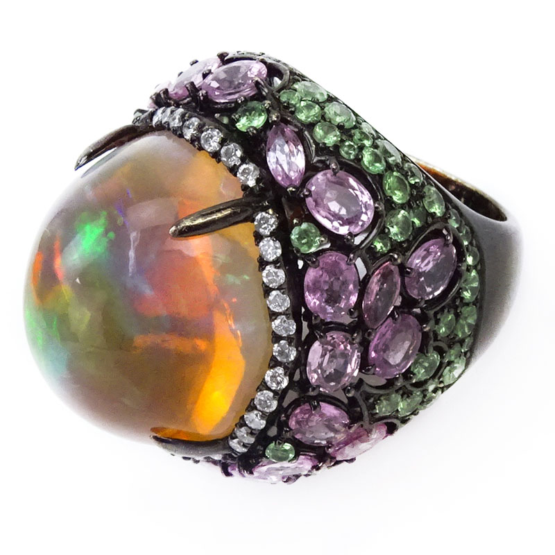 28.19 Carat Cabochon Opal, Pink and Green Sapphire, .52 Carat Diamond and 18 Karat Gold Ring. 