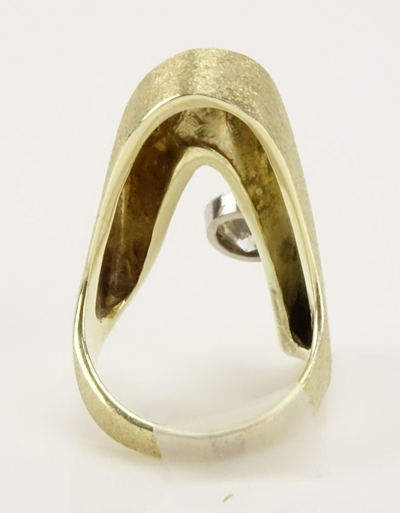 Lady's Retro Approx. .95 Carat Round Brilliant Cut Diamond and 14 Karat Yellow Gold Ring.