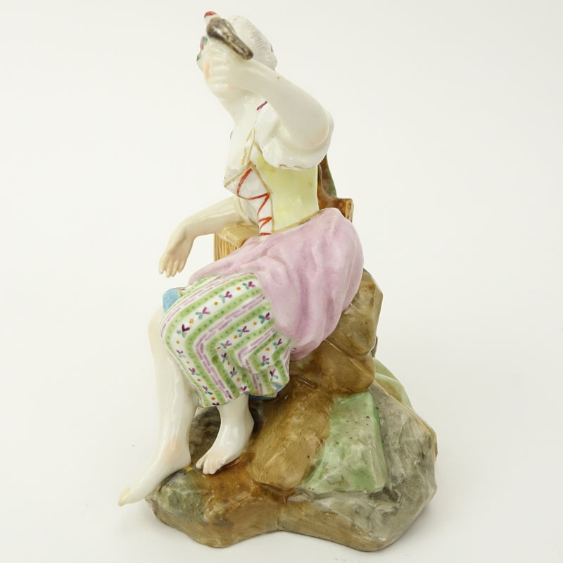 19th Century Meissen Porcelain Seated Girl with Bird Figurine