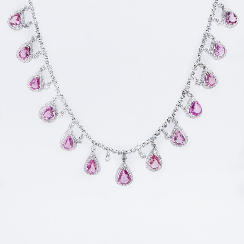  20.13 Carat Pear Shape Pink Sapphire, 13.05 Carat Round Brilliant Cut Diamond and 18 Karat White Gold Necklace.