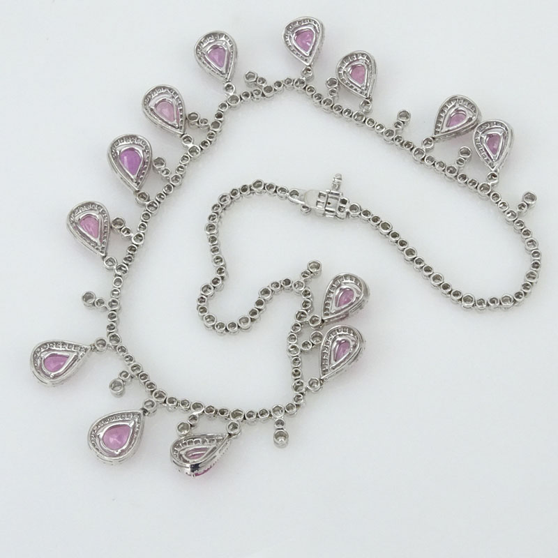  20.13 Carat Pear Shape Pink Sapphire, 13.05 Carat Round Brilliant Cut Diamond and 18 Karat White Gold Necklace.
