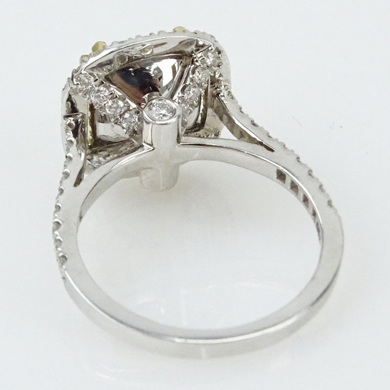 GIA Certified 4.01 Carat Cushion Cut Fancy Light Yellow Diamond and 18 Karat White Gold Engagement Ring