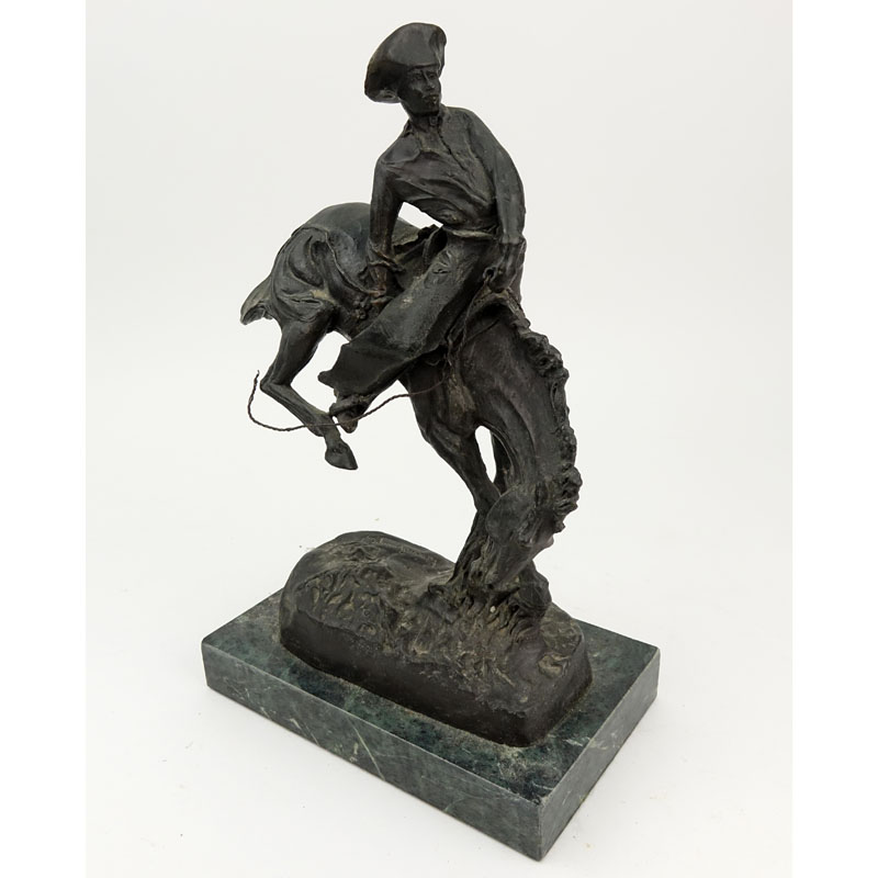 After: Frederic Remington, American (1861-1909) "Bucking Bronco" Bronze Sculpture on Marble Base