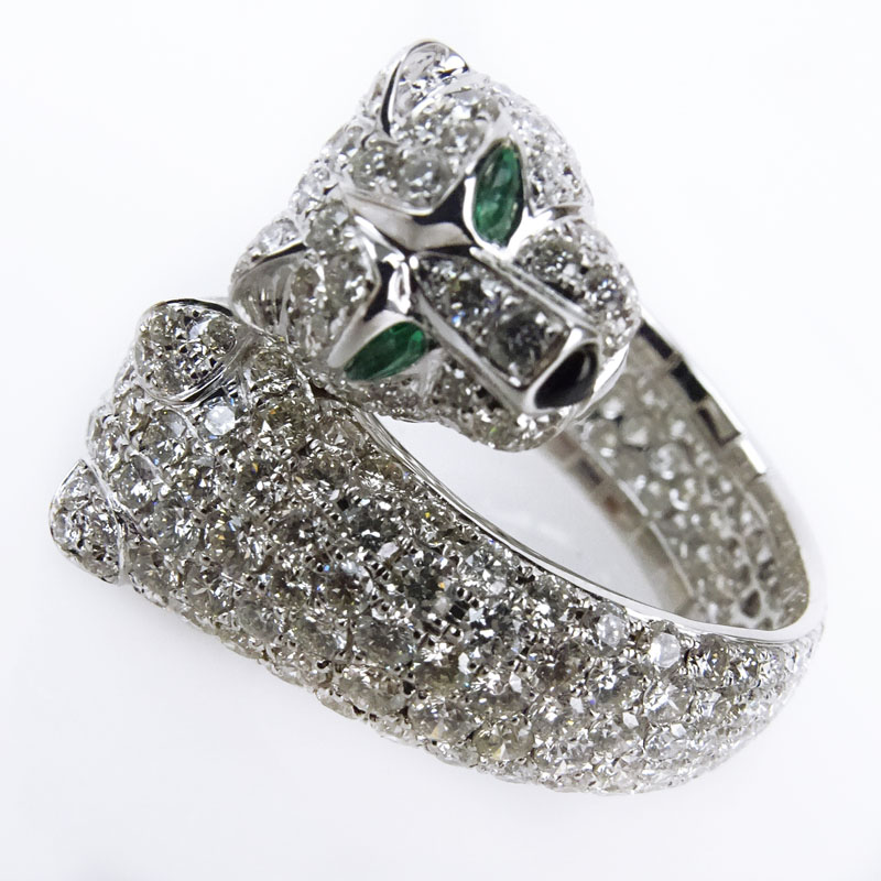 6.25 Carat Pave Set Round Brilliant Cut Diamond and 18 Karat White Gold Panther Ring with Emerald Eyes.