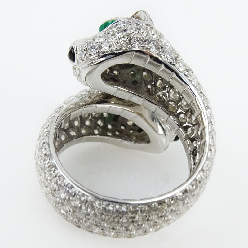 6.25 Carat Pave Set Round Brilliant Cut Diamond and 18 Karat White Gold Panther Ring with Emerald Eyes.