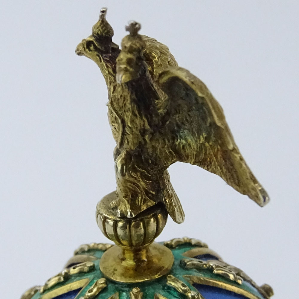 Early 20th Century Russian Gilt Silver, Nephrite Jade and Guilloche Enamel Egg accented with Rose Cut Diamonds and Seed Pearls and Topped with a Double Eagle Finial