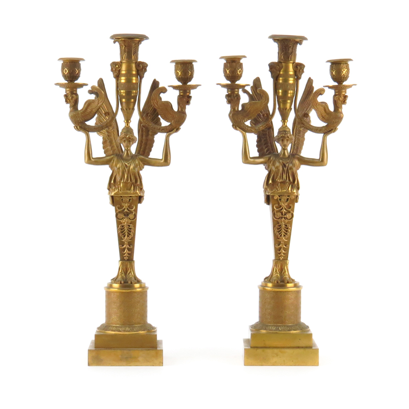 In the manner of Pierre Philippe Thomire, French (1751-1843) Pair of Early 20th Century French Empire Style Three Arm Gilt Bronze Candelabras