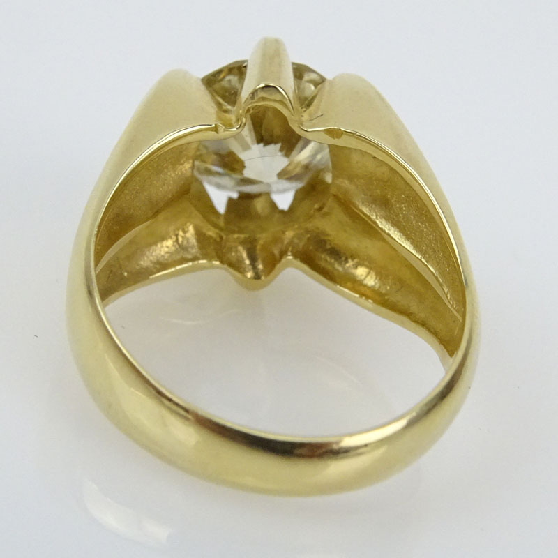 4.16 Carat Round Brilliant Cut Light Yellow Diamond and 14 Karat Yellow Gold Ring.