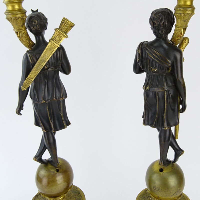 Pair of French 19th Century Charles X Patinated and Gilt Bronze Figural Four Light Candelabra