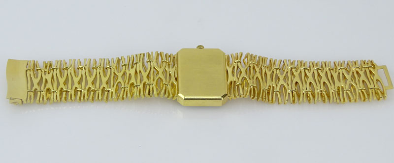 Rare Circa 1965 Gilbert Albert Design 18 Karat Yellow Gold Omega d'Or Model Free Formed Bracelet Watch with Rock Crystal top